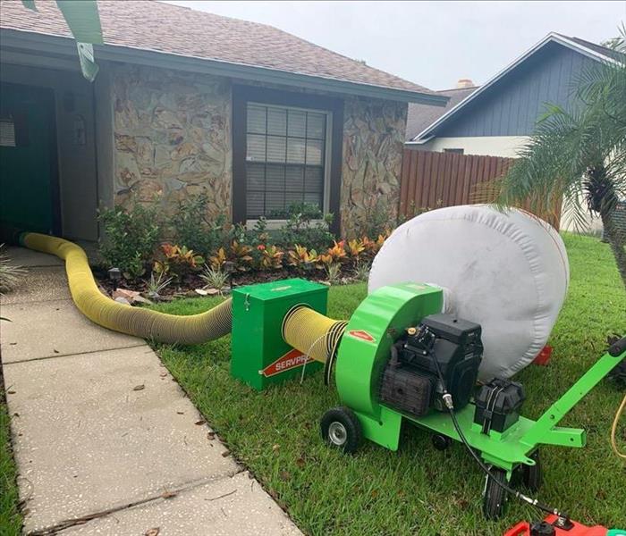 Outdoor SERVPRO equipment for air quality control during mold remediation