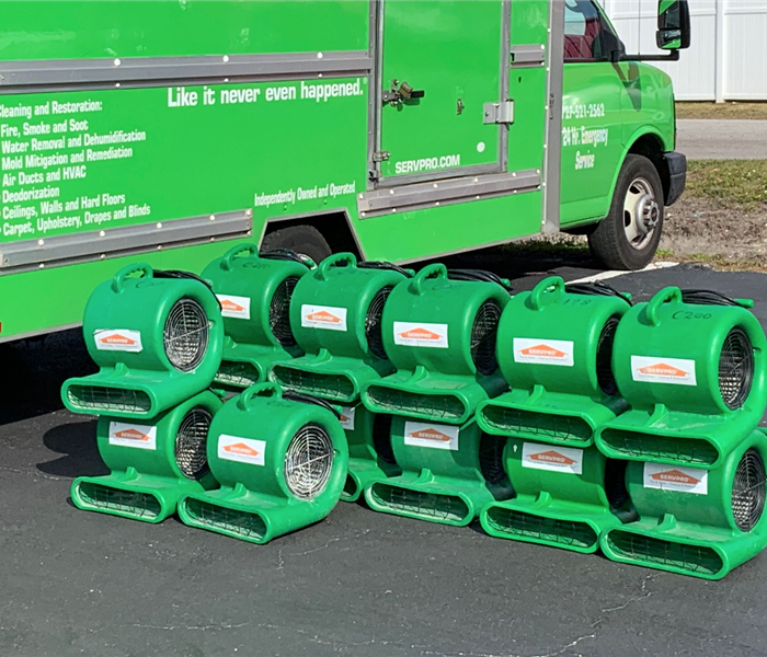 A SERVPRO vehicle with equipment. 